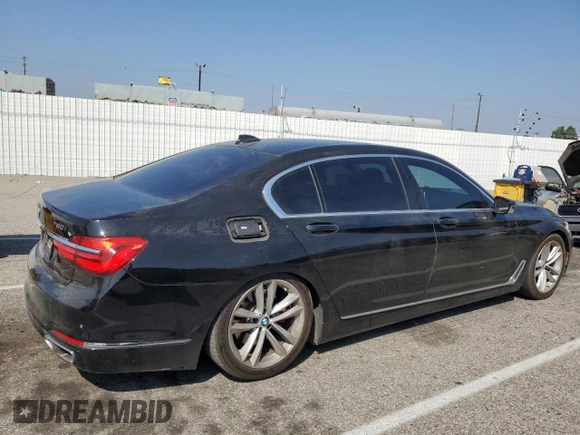 2016 BMW 7 Series 740i with VIN WBA7E2C59GG547804, listed as a Copart auction lot 68620463 with 122,937 mi miles. Bid and sale history available at carsss.com. Image 3.