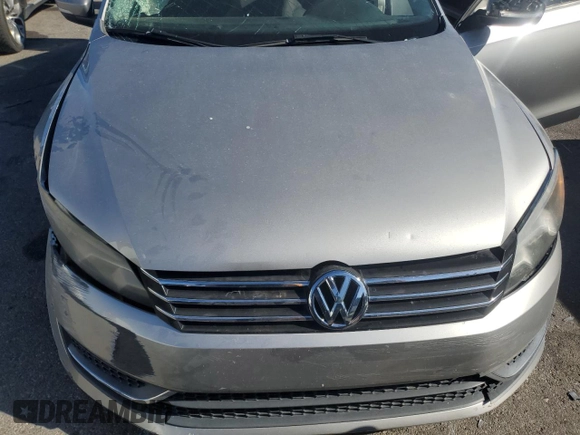 2013 Volkswagen Passat S z VIN 1VWAP7A31DC140626, wystawiony jako Copart lot #89140965 z przebiegiem 17 328 mil mil oraz Szkoda całkowita • Salvage title. Historia ofert i sprzedaży dostępna na DreamBid. Obrazek 11.