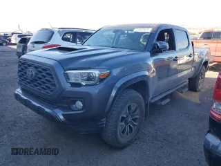 2021 Toyota Tacoma SR5 with VIN 3TMDZ5BNXMM099958, listed as a Copart auction lot 41842825 with 92,159 mi miles and Salvage title. Bid and sale history available at DreamBid. Image 1.