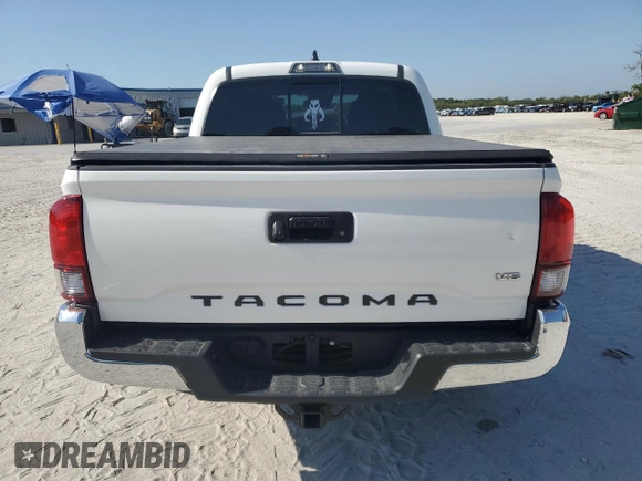 2023 Toyota Tacoma SR5 z VIN 3TMAZ5CN3PM212056, wystawiony jako Copart lot #57217735 z przebiegiem 36 533 mil mil oraz Szkoda całkowita • Salvage title. Historia ofert i sprzedaży dostępna na DreamBid. Obrazek 6.