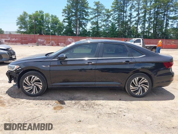 2020 Volkswagen Jetta SEL z VIN 3VWEB7BU2LM052964, wystawiony jako IAAI lot #42316780 z przebiegiem 79 929 mil mil oraz . Historia ofert i sprzedaży dostępna na DreamBid. Obrazek 15.