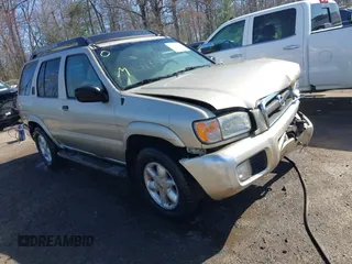 2002 Nissan Pathfinder SE z VIN JN8DR09Y82W717024, wystawiony jako IAAI lot #41819237 z przebiegiem 216 760 mil mil oraz . Historia ofert i sprzedaży dostępna na DreamBid. Obrazek 1.