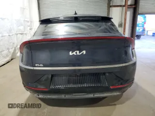 2023 Kia EV6 Wind with VIN KNDC34LA9P5604093, listed as a Copart auction lot 46487755 with 26,682 mi miles and Salvage Title. Bid and sale history available at carsss.com. Image 6.