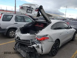 2023 BMW i4 eDrive40 z VIN WBY73AW05PFR28279, wystawiony jako IAAI lot #41262952 z przebiegiem 40 011 mil mil oraz . Historia ofert i sprzedaży dostępna na DreamBid. Obrazek 22.