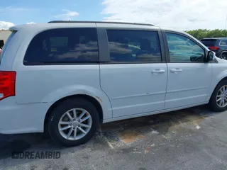 2014 Dodge Grand Caravan SXT with VIN 2C4RDGCGXER322705, listed as a IAAI auction lot 42170301 with 147,070 mi miles and . Bid and sale history available at DreamBid. Image 6.