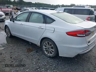 2020 Ford Fusion SE z VIN 3FA6P0HD8LR160330, wystawiony jako IAAI lot #42348552 z przebiegiem 95 610 mil mil oraz . Historia ofert i sprzedaży dostępna na DreamBid. Obrazek 3.