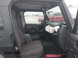 2004 Jeep Wrangler X with VIN 1J4FA39S34P753865, listed as a IAAI auction lot 41948545 with 198,169 mi miles. Bid and sale history available at carsss.com. Image 5.