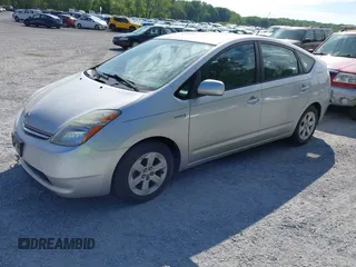 2007 Toyota Prius with VIN JTDKB20U777634652, listed as a IAAI auction lot 42182657 with 200,657 mi miles and . Bid and sale history available at DreamBid. Image 2.