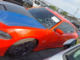 2020 Dodge Charger Scat Pack z VIN 2C3CDXGJ1LH221572, wystawiony jako IAAI lot #41286078 z przebiegiem 67 514 mil mil oraz . Historia ofert i sprzedaży dostępna na DreamBid. Obrazek 14.