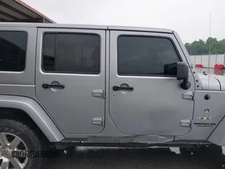 2017 Jeep Wrangler Unlimited Sahara with VIN 1C4BJWEG8HL681775, listed as a IAAI auction lot 42424924 with 87,068 mi miles and . Bid and sale history available at DreamBid. Image 13.