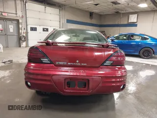2002 Pontiac Grand Am SE z VIN 1G2NE52F92C291335, wystawiony jako IAAI lot #41665150 z przebiegiem 75 552 mil mil oraz . Historia ofert i sprzedaży dostępna na DreamBid. Obrazek 17.