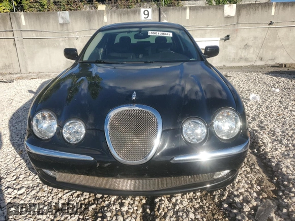 2000 Jaguar S-Type V8 z VIN SAJDA01D4YGL61655, wystawiony jako Copart lot #85873054 z przebiegiem 85 239 mil mil oraz Nie do naprawy • Non repairable. Historia ofert i sprzedaży dostępna na DreamBid. Obrazek 5.