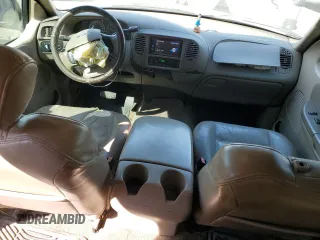 2002 Ford F-150 XLT with VIN 1FTRW07L32KE29159, listed as a Copart auction lot 50596125 with 198,058 mi miles and Salvage Title. Bid and sale history available at carsss.com. Image 8.