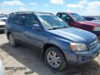 2007 Toyota Highlander w/3rd Row z VIN JTEDW21AX70021561, wystawiony jako IAAI lot #42210607 z przebiegiem 152 372 mil mil oraz . Historia ofert i sprzedaży dostępna na DreamBid. Obrazek 1.