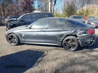 2019 BMW 4 Series 440i xDrive with VIN WBA4J7C52KBM75345, listed as a IAAI auction lot 40613703 with 31,402 mi miles and . Bid and sale history available at carsss.com. Image 14.
