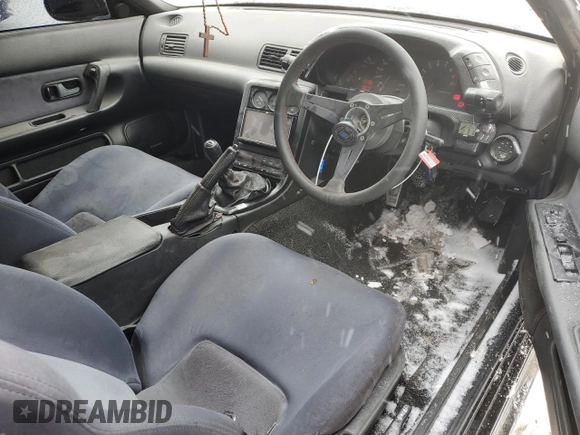 1991 Nissan Skyline z VIN BNR32016641, wystawiony jako Copart lot #87935775 z przebiegiem 166 776 mil mil oraz Szkoda całkowita • Salvage title. Historia ofert i sprzedaży dostępna na DreamBid. Obrazek 8.