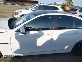 2014 BMW 5 Series 528i with VIN WBA5A5C52ED507292, listed as a IAAI auction lot 41930226 with 98,591 mi miles. Bid and sale history available at carsss.com. Image 15.