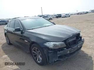 2015 BMW 5 Series 528i with VIN WBA5A5C58FD520694, listed as a IAAI auction lot 41804906 with 121,636 mi miles. Bid and sale history available at carsss.com. Image 1.