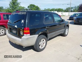 2006 Ford Escape XLT with VIN 1FMYU03176KA55498, listed as a IAAI auction lot 42499429 with 156,298 mi miles and . Bid and sale history available at DreamBid. Image 4.