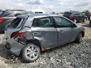 2011 Mazda 2 Sport z VIN JM1DE1HY1B0124249, wystawiony jako Copart lot #56141275 z przebiegiem 249 890 mil mil oraz Szkoda całkowita • Salvage title. Historia ofert i sprzedaży dostępna na DreamBid. Obrazek 3.