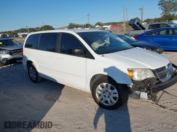 2014 Dodge Grand Caravan SE with VIN 2C4RDGBG1ER220534, listed as a IAAI auction lot 41262990 with 77,851 mi miles and . Bid and sale history available at DreamBid. Image 1.