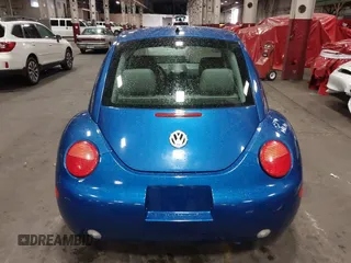 2004 Volkswagen New Beetle Coupe GLS with VIN 3VWCK31C14M421761, listed as a IAAI auction lot 41771431 with 76,184 mi miles. Bid and sale history available at carsss.com. Image 17.