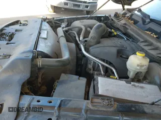 2014 Ram 1500 Express z VIN 1C6RR7KT7ES117056, wystawiony jako IAAI lot #43397098 z przebiegiem 150 197 mil mil oraz . Historia ofert i sprzedaży dostępna na DreamBid. Obrazek 24.