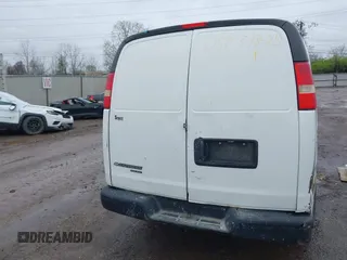 2014 Chevrolet Express Cargo Van with VIN 1GCWGGCA0E1155572, listed as a IAAI auction lot 41965353 with 324,538 mi miles. Bid and sale history available at carsss.com. Image 16.