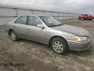 2000 Toyota Camry CE with VIN JT2BG22K6Y0471945, listed as a Copart auction lot 48932715 with Not Provided miles and Salvage Title. Bid and sale history available at DreamBid. Image 4.