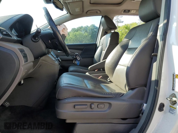 2016 Honda Odyssey Touring Elite with VIN 5FNRL5H97GB129217, listed as a Copart auction lot 52177765 with 138,045 mi miles and Salvage Title. Bid and sale history available at DreamBid. Image 7.