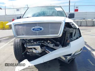 2004 Ford F-150 XLT with VIN 1FTPW14584FA24705, listed as a IAAI auction lot 41883212 with 172,251 mi miles. Bid and sale history available at carsss.com. Image 12.
