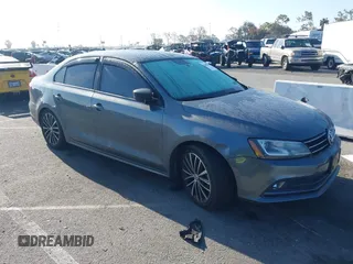 2016 Volkswagen Jetta Sport z VIN 3VWD17AJ0GM386504, wystawiony jako IAAI lot #42000125 z przebiegiem 90 405 mil mil oraz . Historia ofert i sprzedaży dostępna na DreamBid. Obrazek 1.