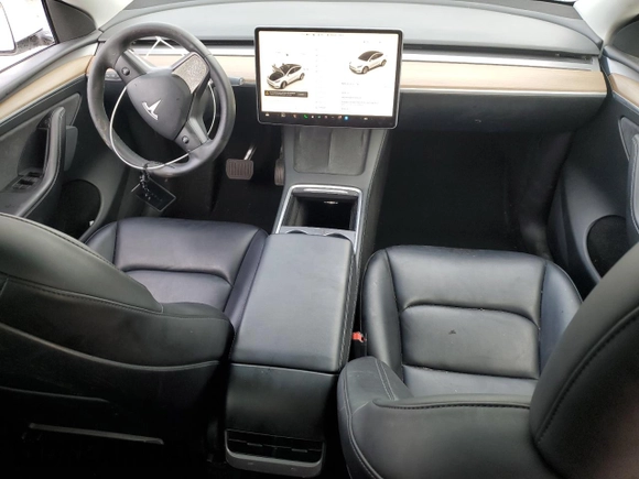 2023 Tesla Model Y Long Range z VIN 7SAYGAEE5PF743079, wystawiony jako Copart lot #45570655 z przebiegiem 46 145 mil mil oraz Szkoda całkowita • Salvage title. Historia ofert i sprzedaży dostępna na DreamBid. Obrazek 8.