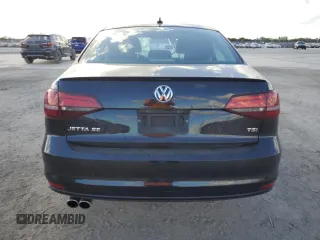 2016 Volkswagen Jetta Sedan 1.4T SE with VIN 3VWD67AJ0GM390490, listed as a Copart auction lot 44711055 with 185,046 mi miles and Salvage Title. Bid and sale history available at carsss.com. Image 6.