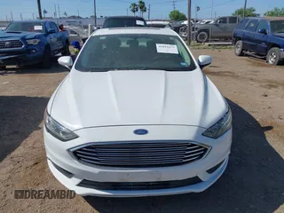2018 Ford Fusion SE z VIN 3FA6P0LU2JR155483, wystawiony jako IAAI lot #42019475 z przebiegiem Nie podano mil oraz . Historia ofert i sprzedaży dostępna na DreamBid. Obrazek 6.