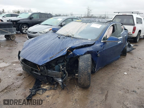 2016 Tesla Model S 90D with VIN 5YJSA1E44GF169960, listed as a IAAI auction lot 41523807 with 124,738 mi miles and . Bid and sale history available at DreamBid. Image 2.