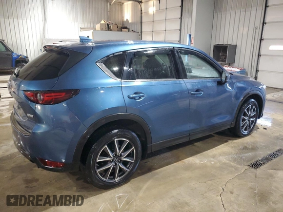 2018 Mazda CX-5 Grand Touring with VIN JM3KFBDM9J0411504, listed as a Copart auction lot 42050825 with 125,695 mi miles and Salvage Title. Bid and sale history available at carsss.com. Image 3.