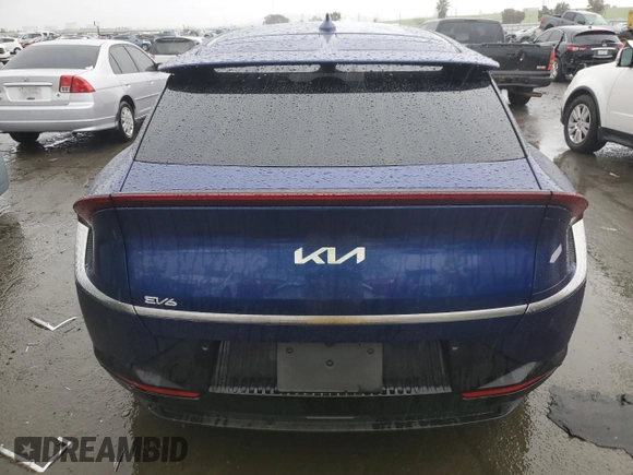 2023 Kia EV6 Wind with VIN KNDC3DLCXP5101979, listed as a Copart auction lot 43812005 with 5,884 mi miles and Salvage Title. Bid and sale history available at carsss.com. Image 6.