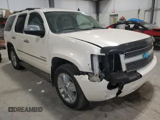 2010 Chevrolet Tahoe LTZ with VIN 1GNUKCE02AR274147, listed as a Copart auction lot 54667545 with 210,207 mi miles and Salvage title. Bid and sale history available at DreamBid. Image 4.