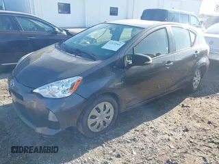 2014 Toyota Prius One with VIN JTDKDTB32E1564580, listed as a IAAI auction lot 41972541 with 186,673 mi miles and . Bid and sale history available at DreamBid. Image 2.
