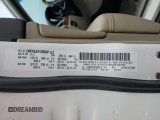 2011 Jeep Grand Cherokee Overland with VIN 1J4RR6GT9BC696319, listed as a Copart auction lot 56914185 with 211,661 mi miles and Salvage title. Bid and sale history available at DreamBid. Image 13.