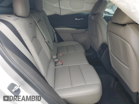 2021 Cadillac XT4 FWD Premium Luxury z VIN 1GYFZCR40MF000293, wystawiony jako Copart lot #58710565 z przebiegiem 49 721 mil mil oraz Szkoda całkowita • Salvage title. Historia ofert i sprzedaży dostępna na DreamBid. Obrazek 10.