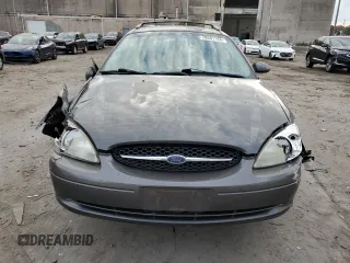 2002 Ford Taurus with VIN 1FAFP59S62A256119, listed as a Copart auction lot 79581164 with 57,128 mi miles and Clean title. Bid and sale history available at DreamBid. Image 5.
