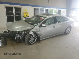 2013 Toyota Avalon XLE with VIN 4T1BK1EB0DU001291, listed as a Copart auction lot 54129175 with 107,242 mi miles and Salvage Title. Bid and sale history available at DreamBid. Image 1.