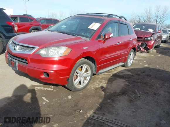 2007 Acura RDX with VIN 5J8TB18237A004911, listed as a IAAI auction lot 41177572 with 130,672 mi miles and . Bid and sale history available at DreamBid. Image 2.