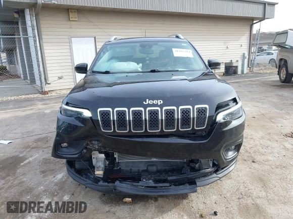 2021 Jeep Cherokee Latitude Lux with VIN 1C4PJMMX1MD216254, listed as a IAAI auction lot 41947214 with 35,445 mi miles and . Bid and sale history available at DreamBid. Image 6.