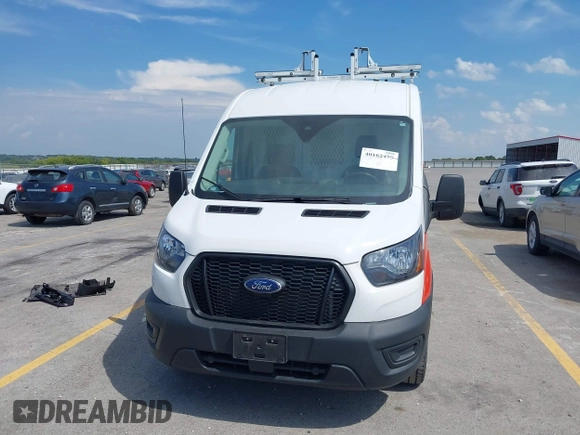 2023 Ford Transit Cargo with VIN 1FTBR1C80PKA43077, listed as a IAAI auction lot 40182475 with 15,656 mi miles and . Bid and sale history available at DreamBid. Image 13.