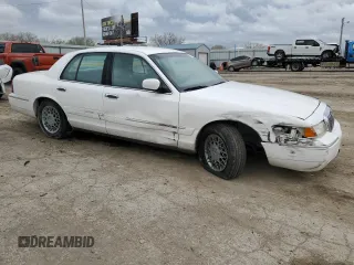 1999 Mercury Grand Marquis GS z VIN 2MEFM74W0XX670924, wystawiony jako Copart lot #51811055 z przebiegiem 176 559 mil mil oraz Szkoda całkowita • Salvage title. Historia ofert i sprzedaży dostępna na DreamBid. Obrazek 4.