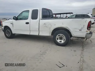 2000 Ford F-150 XL with VIN 1FTRX17W7YNB87528, listed as a Copart auction lot 88470995 with 0 mi miles and Salvage Title. Bid and sale history available at carsss.com. Image 2.