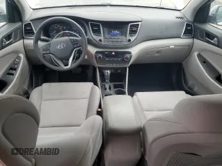 2016 Hyundai Tucson SE z VIN KM8J23A46GU242131, wystawiony jako Copart lot #57599675 z przebiegiem 76 940 mil mil oraz Czysty tytuł • Clean title. Historia ofert i sprzedaży dostępna na DreamBid. Obrazek 8.